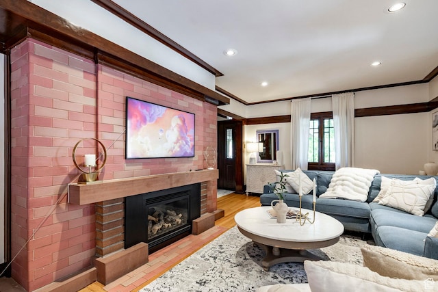 1376 E Perry Ave, Salt Lake City, UT 84103 - living room featuring ornamental molding, a fireplace, and recessed lighting