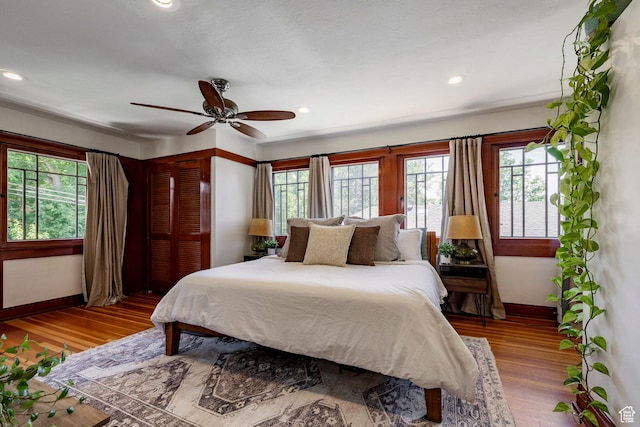 1376 E Perry Ave, Salt Lake City, UT 84103 - bedroom featuring wood finished floors, recessed lighting, a ceiling fan, and a closet