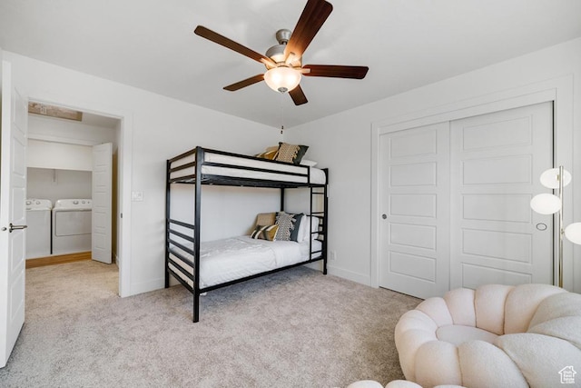 6068 S White Trails Dr, St George, UT 84790 - carpeted bedroom featuring washer and clothes dryer, baseboards, a ceiling fan, and a closet