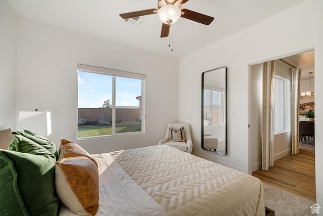 6068 S White Trails Dr, St George, UT 84790 - bedroom with a ceiling fan and baseboards