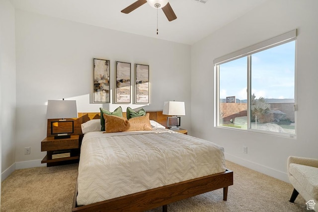 6068 S White Trails Dr, St George, UT 84790 - bedroom with carpet flooring, baseboards, and a ceiling fan