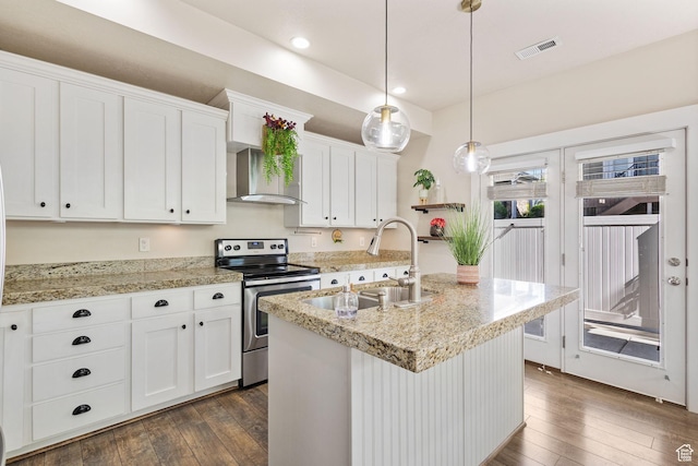 101 E Mansonia Dr S, Draper, UT 84020 - kitchen with stainless steel range with electric cooktop, wall chimney exhaust hood, a sink, dark wood-style flooring, and white cabinets