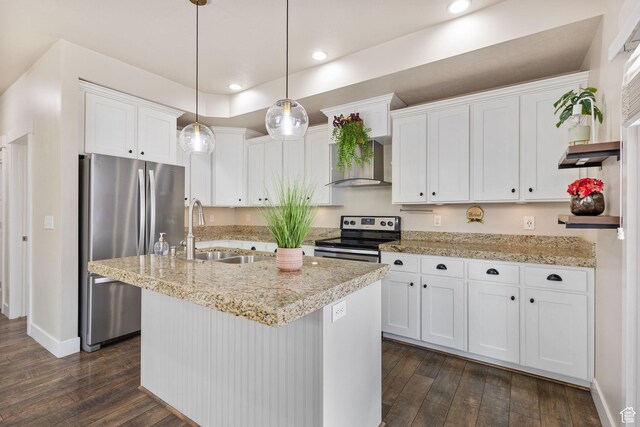 101 E Mansonia Dr S, Draper, UT 84020 - kitchen featuring appliances with stainless steel finishes, a sink, wall chimney range hood, dark wood-type flooring, and white cabinetry