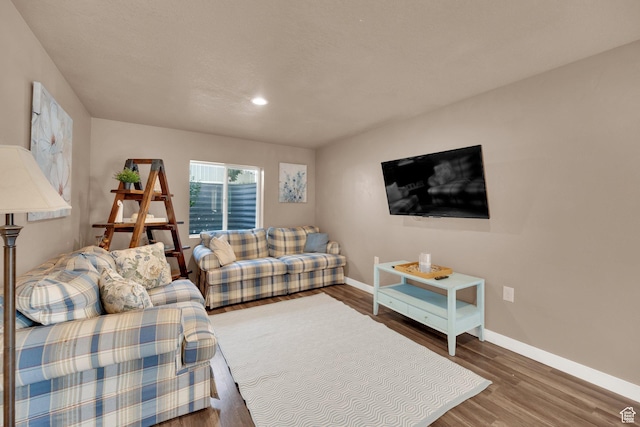 5945 N Spring St, Stansbury Park, UT 84074 - living room with baseboards, wood finished floors, and recessed lighting