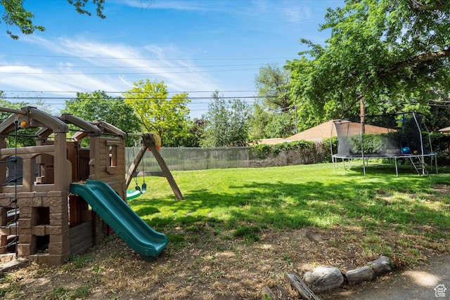 1225 E 5th St, Ogden, UT 84404 - view of yard with a trampoline and a playground