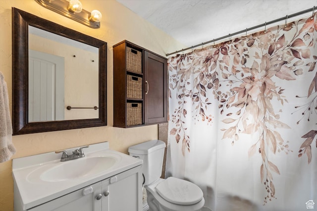 1225 E 5th St, Ogden, UT 84404 - full bath featuring vanity, toilet, curtained shower, a textured wall, and a textured ceiling