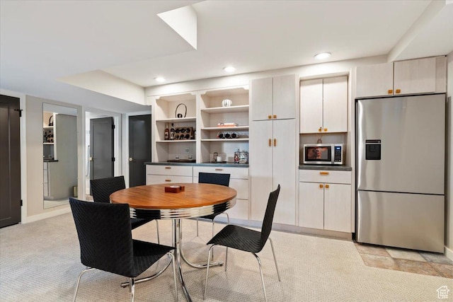 785 E Tenth Ave N, Salt Lake City, UT 84103 - dining area with recessed lighting, light colored carpet, and baseboards