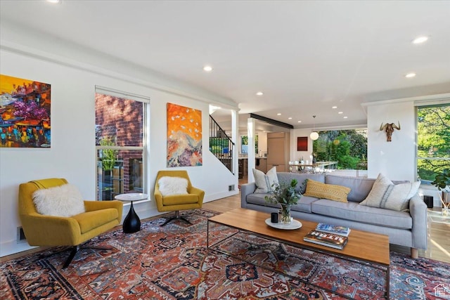 785 E Tenth Ave N, Salt Lake City, UT 84103 - living room featuring recessed lighting, stairs, wood finished floors, baseboards, and decorative columns
