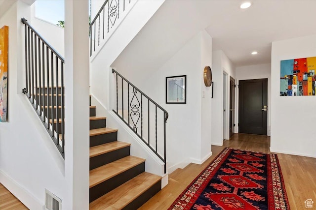 785 E Tenth Ave N, Salt Lake City, UT 84103 - foyer with recessed lighting, wood finished floors, stairs, and baseboards