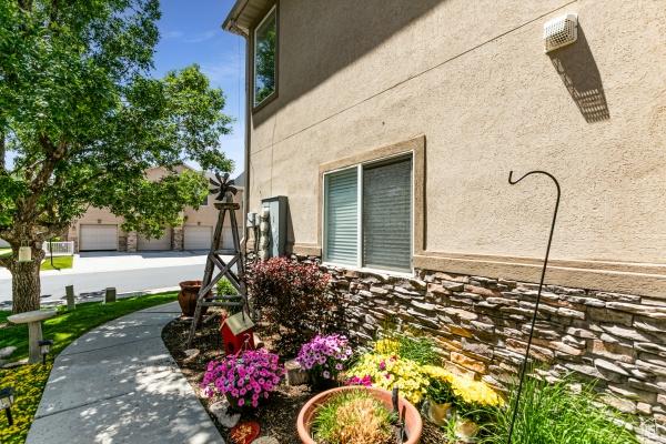 4732 W Wagon Train Dr, Herriman, UT 84096 - view of side of home with stucco siding