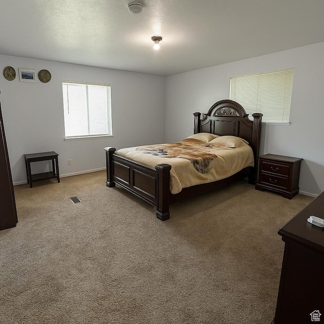 3291 S 4000 W, West Valley City, UT 84120 - bedroom featuring light carpet and baseboards
