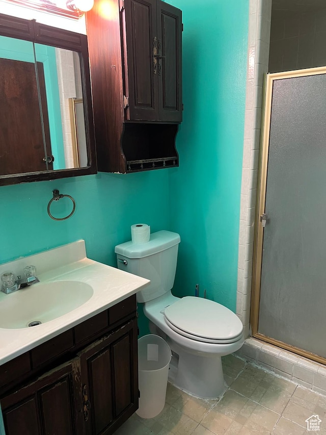 3291 S 4000 W, West Valley City, UT 84120 - bathroom featuring vanity, a shower stall, and toilet