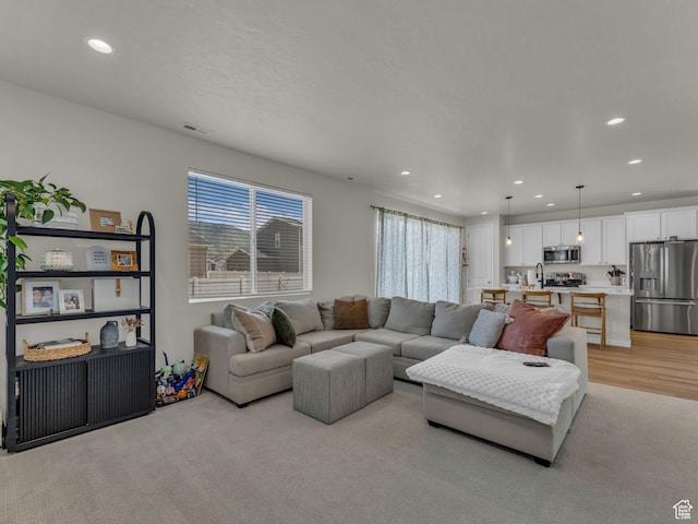 6352 N Canter Dr, Stansbury Park, UT 84074 - living room featuring recessed lighting