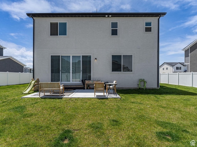 6352 N Canter Dr, Stansbury Park, UT 84074 - rear view of house with a patio area and stucco siding