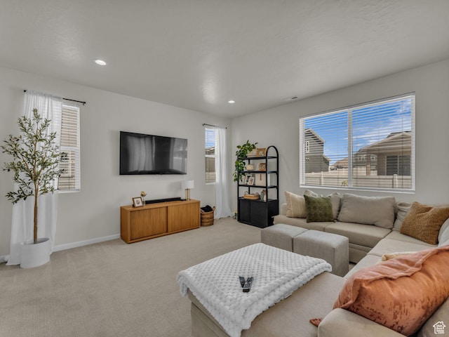 6352 N Canter Dr, Stansbury Park, UT 84074 - living area with light carpet, recessed lighting, and baseboards