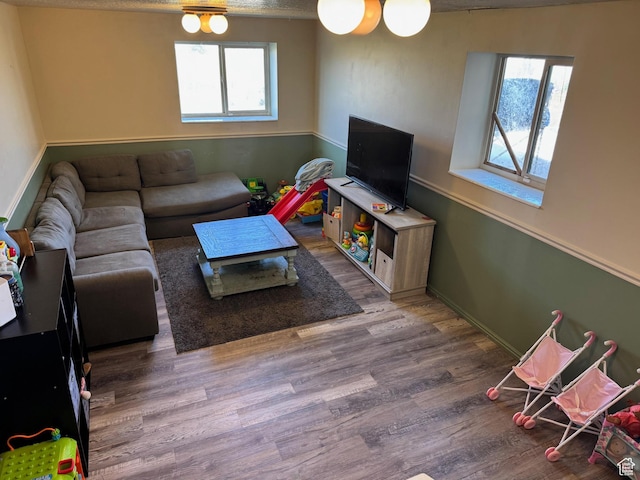 39 S 1300 W, Clearfield, UT 84015 - living area with wood finished floors and baseboards