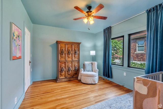 1440 E 1300 S, Salt Lake City, UT 84105 - bedroom with light wood finished floors, baseboards, and a ceiling fan