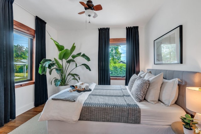 1440 E 1300 S, Salt Lake City, UT 84105 - bedroom with wood finished floors, ceiling fan, and baseboards