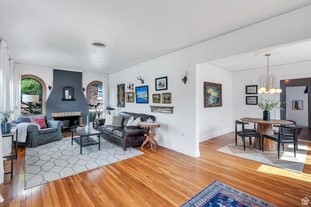 1440 E 1300 S, Salt Lake City, UT 84105 - living room with wood-type flooring and a chandelier