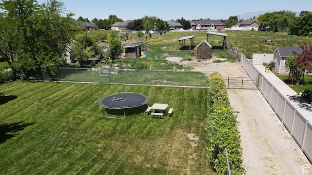 1254 W 2700 S, Syracuse, UT 84075 - view of yard with a trampoline and a residential view