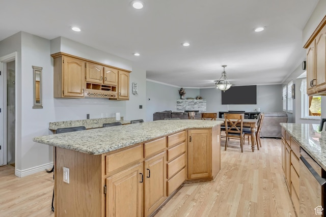 1254 W 2700 S, Syracuse, UT 84075 - kitchen with dishwasher, open floor plan, light wood-style flooring, a center island, and light brown cabinetry