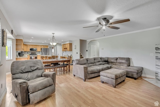 1254 W 2700 S, Syracuse, UT 84075 - living area featuring arched walkways, a ceiling fan, baseboards, light wood-type flooring, and recessed lighting