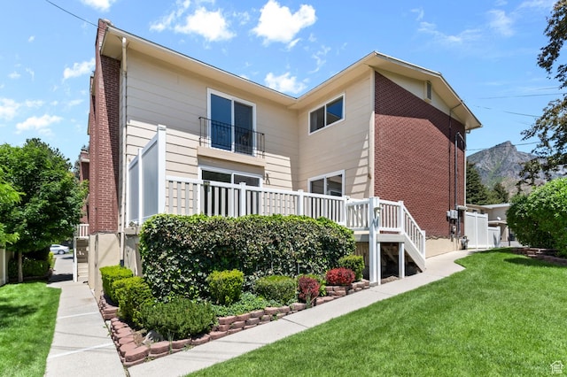 2091 N 180 E, Provo, UT 84604 - back of house with a lawn and brick siding