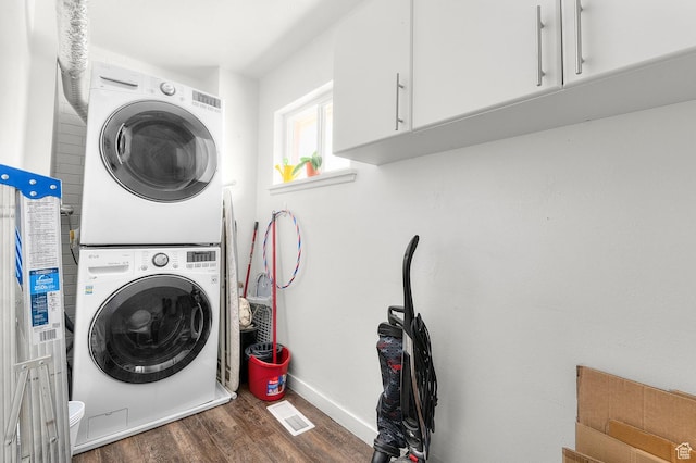 2091 N 180 E, Provo, UT 84604 - washroom featuring stacked washer / drying machine, wood finished floors, and cabinet space