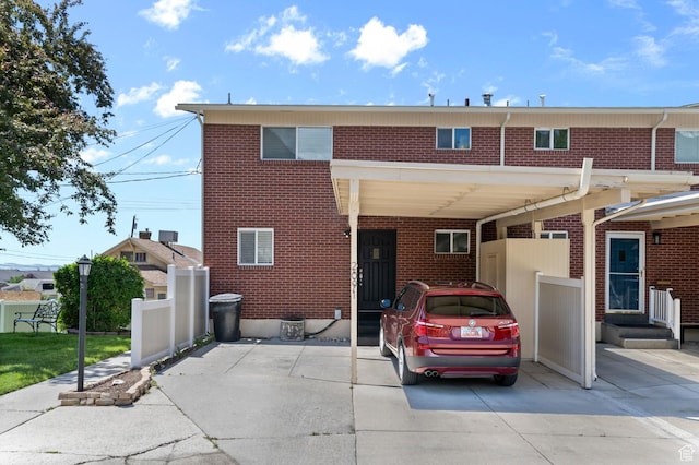 2091 N 180 E, Provo, UT 84604 - view of property featuring brick siding and a carport
