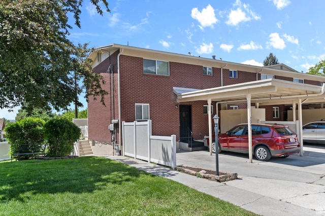 2091 N 180 E, Provo, UT 84604 - view of front of home featuring brick siding and a carport