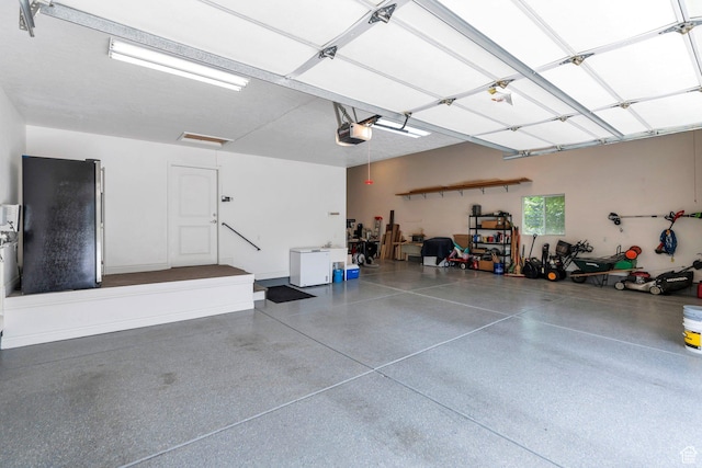 1736 S Range Rd, Saratoga Springs, UT 84045 - garage featuring a garage door opener