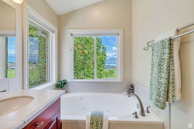 1736 S Range Rd, Saratoga Springs, UT 84045 - bathroom with vanity, a whirlpool tub, and lofted ceiling