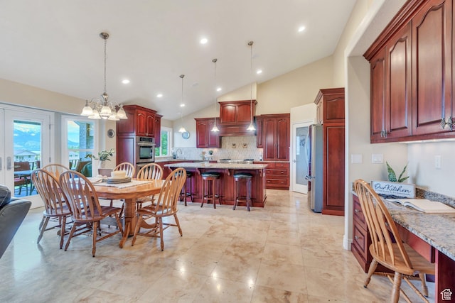 1736 S Range Rd, Saratoga Springs, UT 84045 - dining room featuring vaulted ceiling, a chandelier, recessed lighting, and plenty of natural light