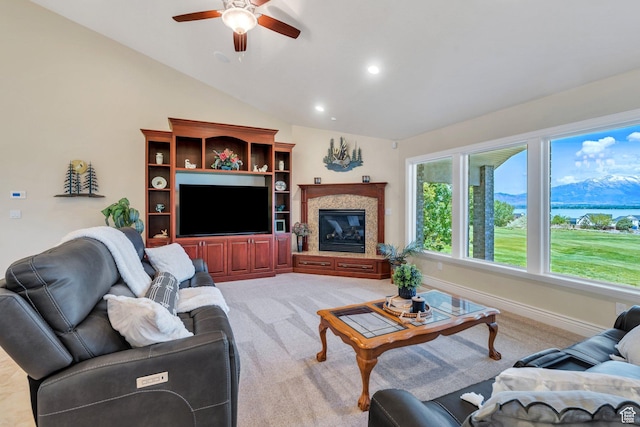 1736 S Range Rd, Saratoga Springs, UT 84045 - living area with ceiling fan, light carpet, recessed lighting, lofted ceiling, and a glass covered fireplace