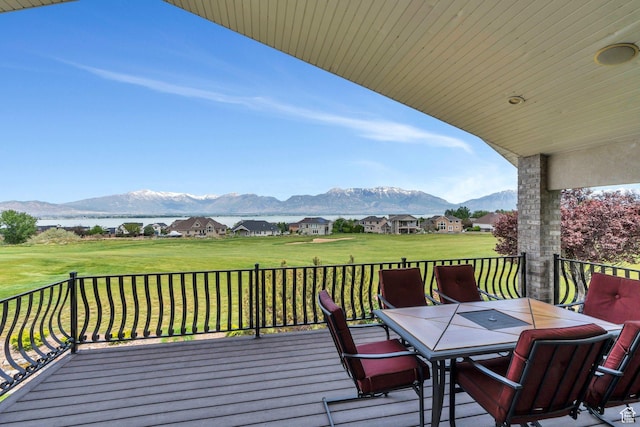 1736 S Range Rd, Saratoga Springs, UT 84045 - deck featuring a mountain view, outdoor dining space, and a yard
