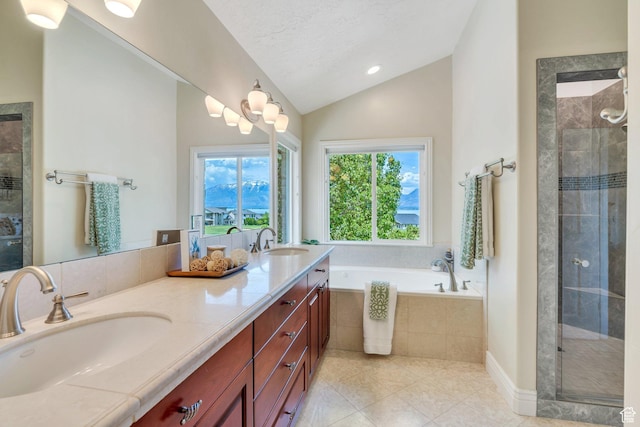 1736 S Range Rd, Saratoga Springs, UT 84045 - full bathroom with lofted ceiling, double vanity, a garden tub, tile patterned floors, and a shower stall