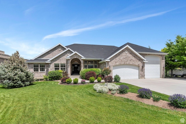 1736 S Range Rd, Saratoga Springs, UT 84045 - view of front of property with an attached garage, brick siding, a front yard, and driveway