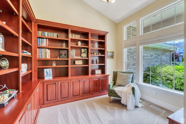 1736 S Range Rd, Saratoga Springs, UT 84045 - sitting room featuring lofted ceiling, light carpet, and baseboards
