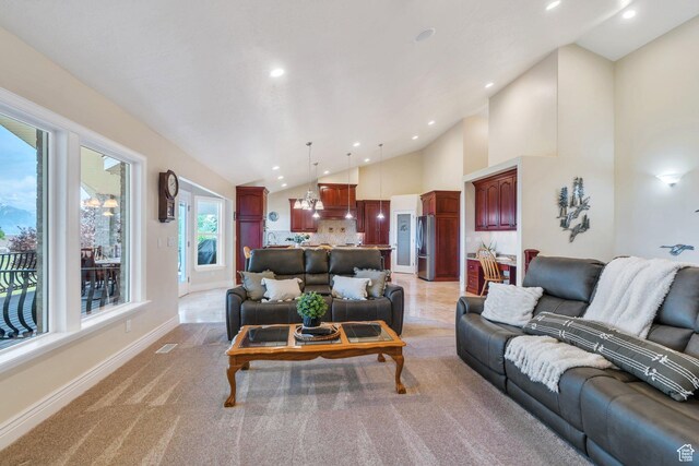 1736 S Range Rd, Saratoga Springs, UT 84045 - living room with recessed lighting, baseboards, light colored carpet, and high vaulted ceiling