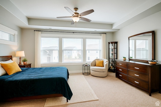 13211 S Weatherford Ln W, Herriman, UT 84096 - bedroom featuring light carpet, multiple windows, a ceiling fan, and baseboards