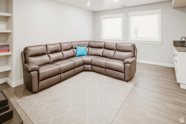 13211 S Weatherford Ln W, Herriman, UT 84096 - living room featuring baseboards, recessed lighting, and light wood-type flooring