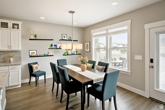 13211 S Weatherford Ln W, Herriman, UT 84096 - dining space with wood finished floors, recessed lighting, and baseboards