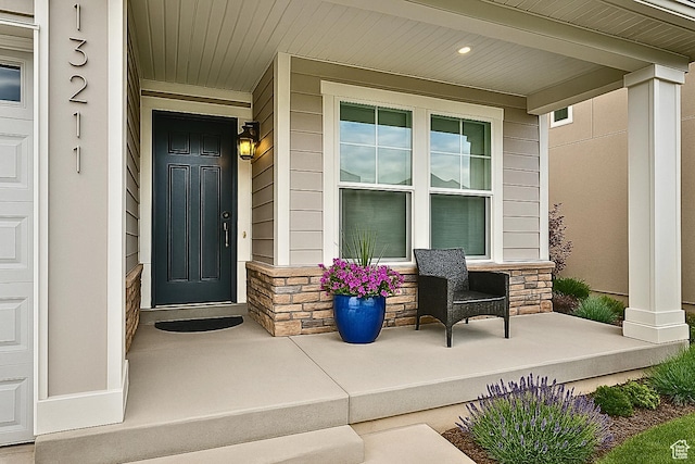 13211 S Weatherford Ln W, Herriman, UT 84096 - doorway to property with a porch and stone siding