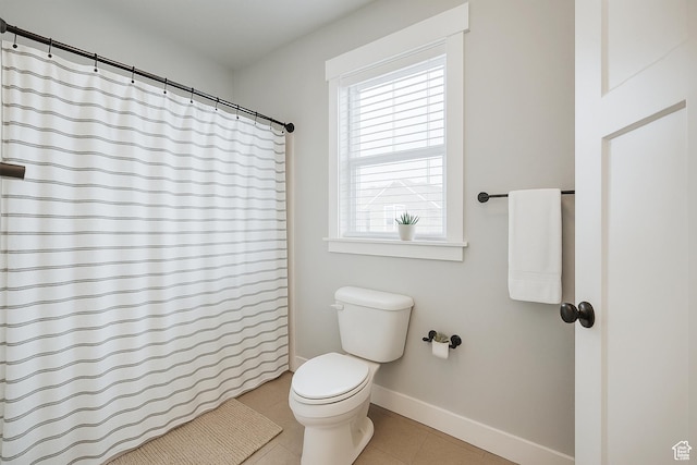 13211 S Weatherford Ln W, Herriman, UT 84096 - bathroom with toilet, baseboards, tile patterned flooring, and a shower with curtain