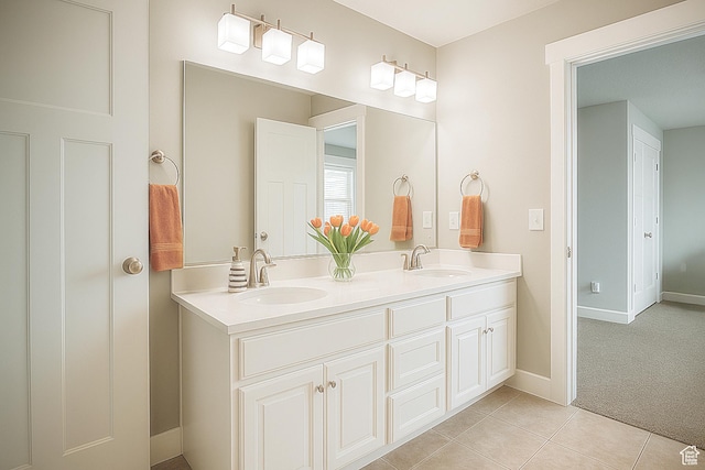 13211 S Weatherford Ln W, Herriman, UT 84096 - full bath featuring double vanity, tile patterned flooring, and baseboards