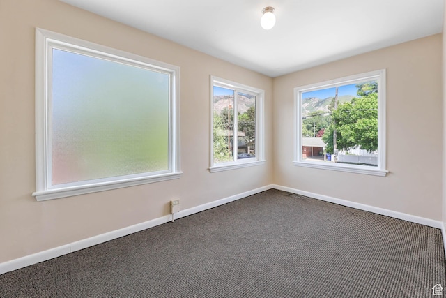 810 Canyon Rd, Ogden, UT 84404 - empty room featuring carpet and baseboards
