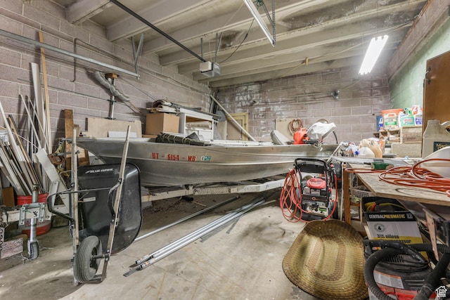 810 Canyon Rd, Ogden, UT 84404 - garage with a garage door opener and concrete block wall
