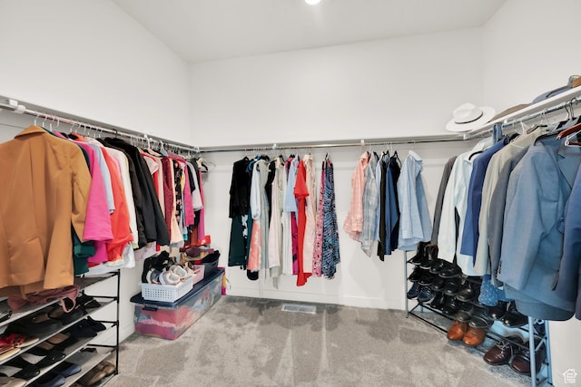 7405 W Glowing Sky Dr S, West Valley City, UT 84081 - walk in closet featuring carpet flooring