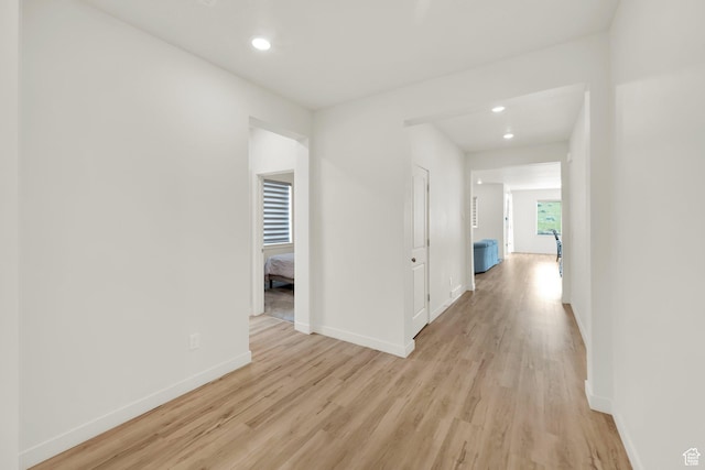 7405 W Glowing Sky Dr S, West Valley City, UT 84081 - corridor featuring light wood-style floors, baseboards, and recessed lighting