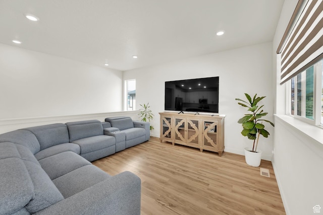 7405 W Glowing Sky Dr S, West Valley City, UT 84081 - living area featuring light wood-style flooring, recessed lighting, and baseboards